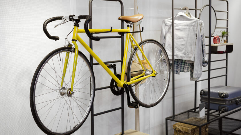 Idea of modern interior room design with shelf and bike.